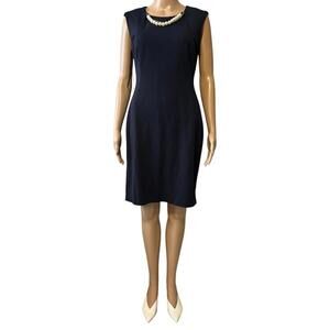 Elegant Black Dress with Pearl Accents